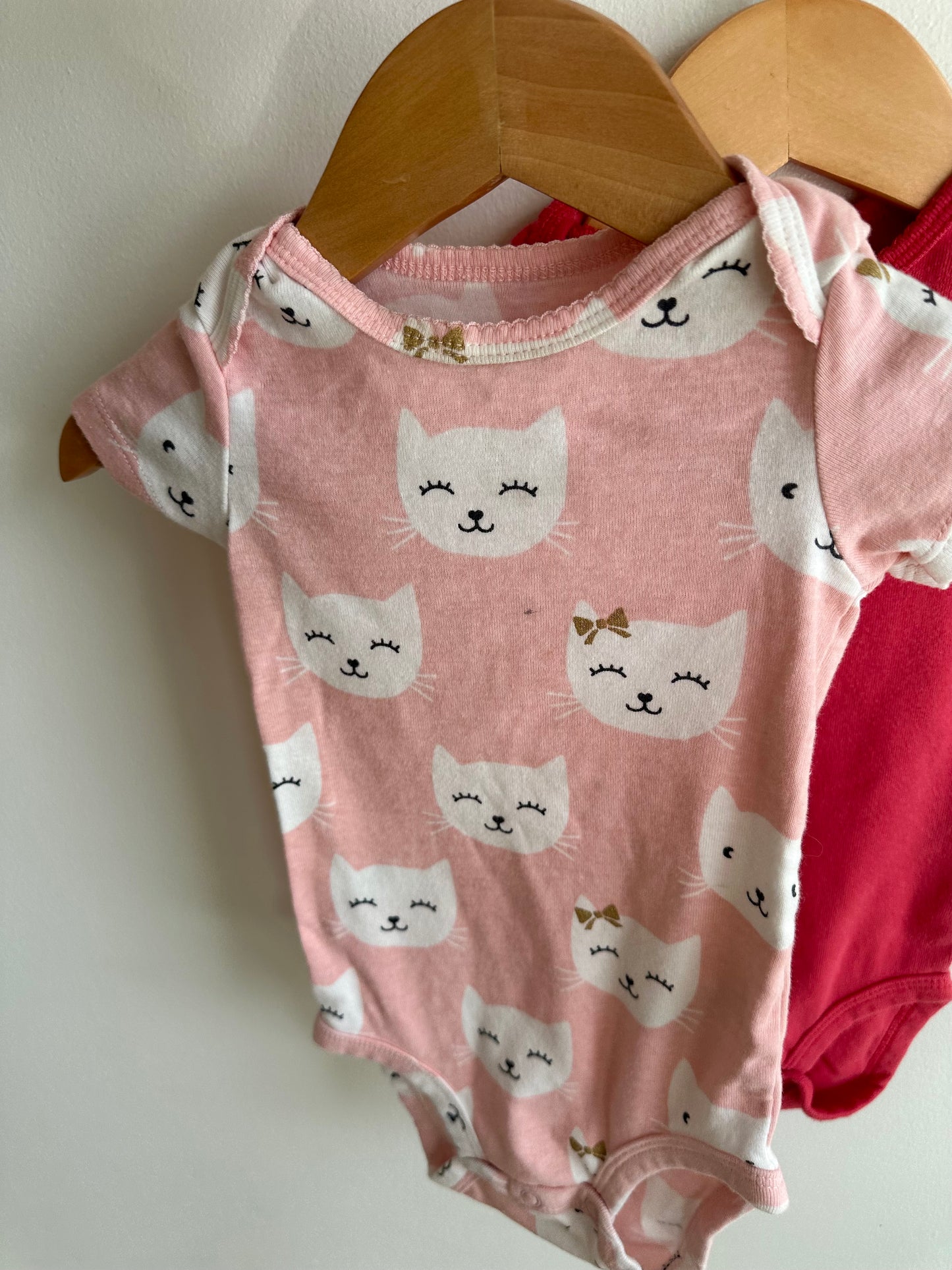Set of 4 Bodysuits / 12m