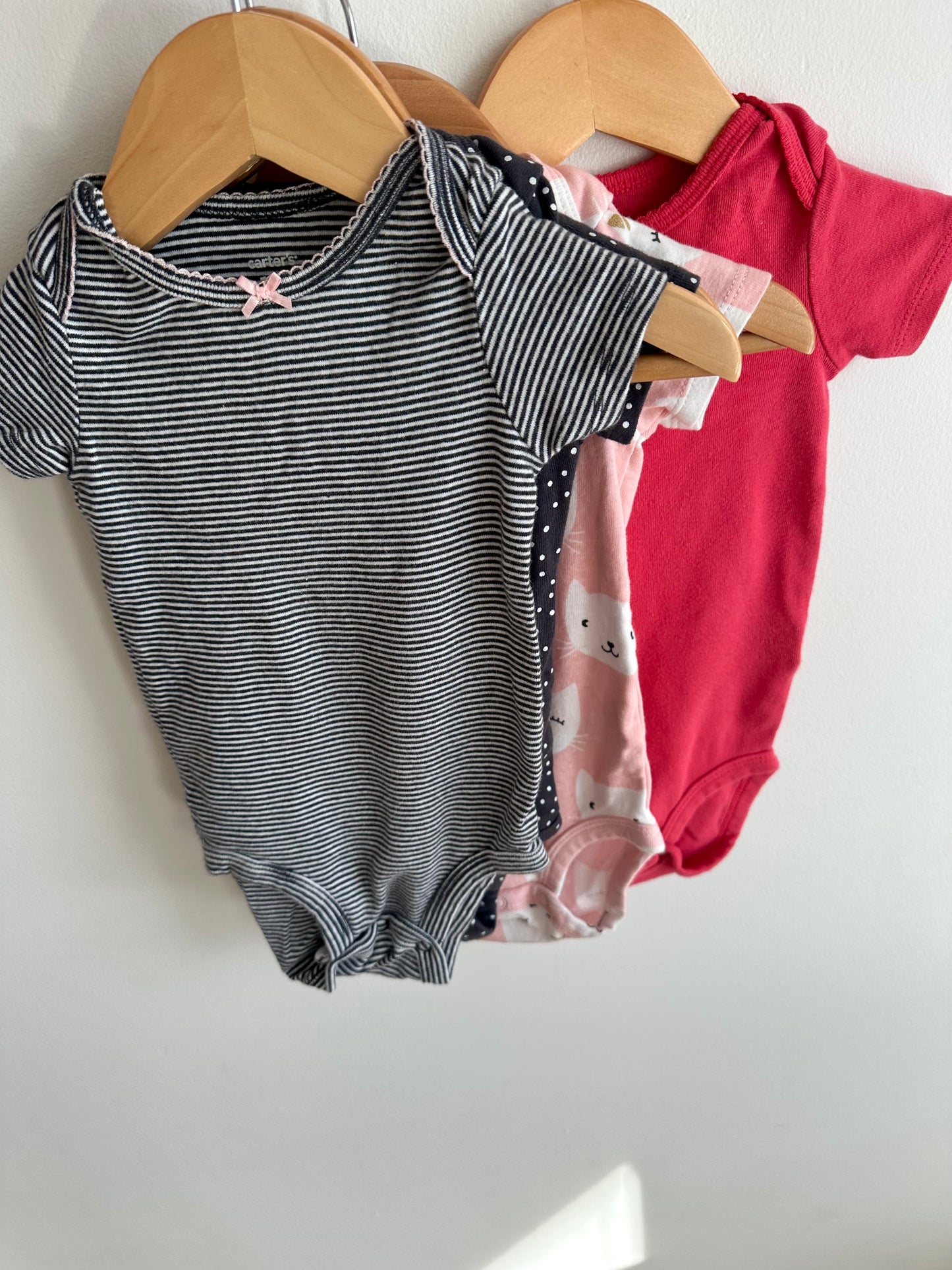 Set of 4 Bodysuits / 12m