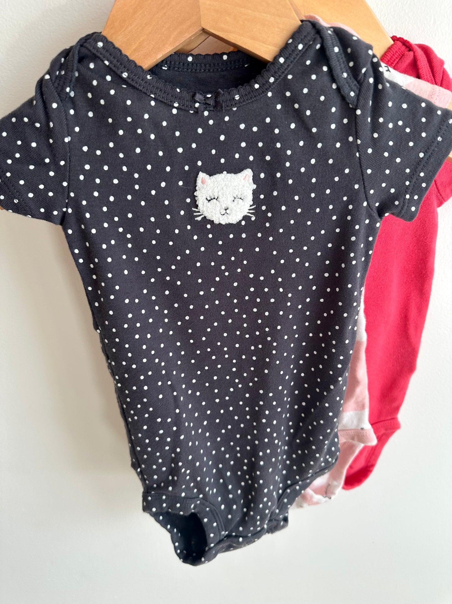 Set of 4 Bodysuits / 12m