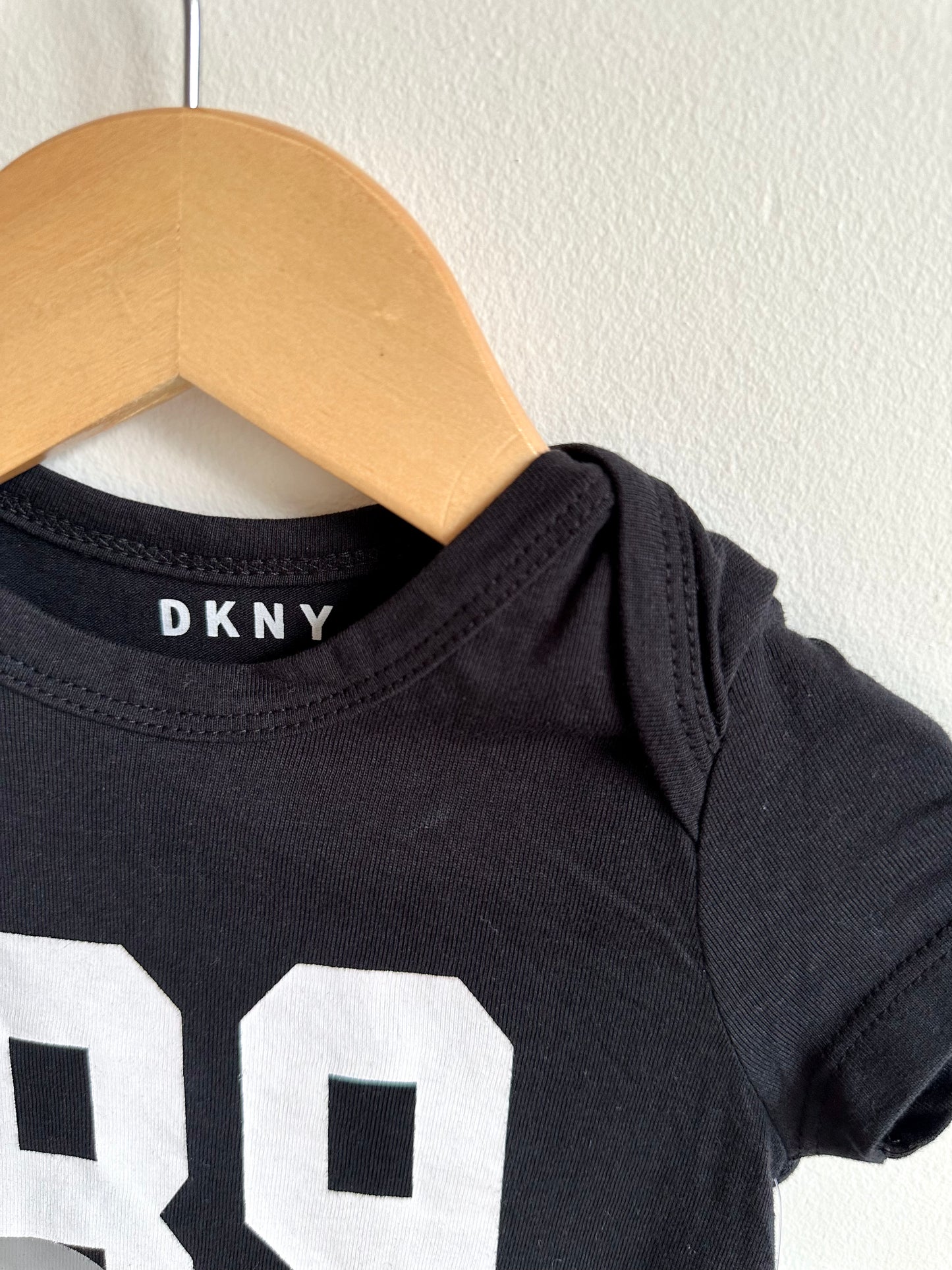 DKNY Bodysuit (Tags On) / 6-9m