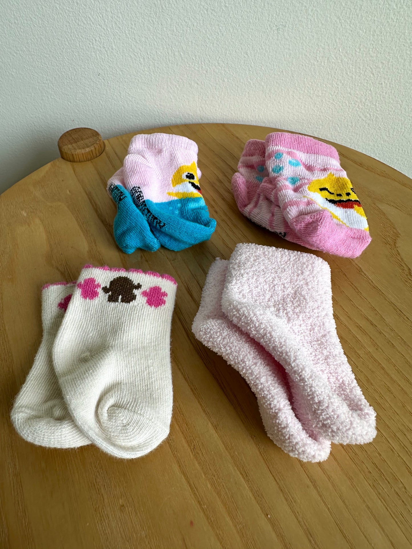Four Sets of Socks / 0-3m?