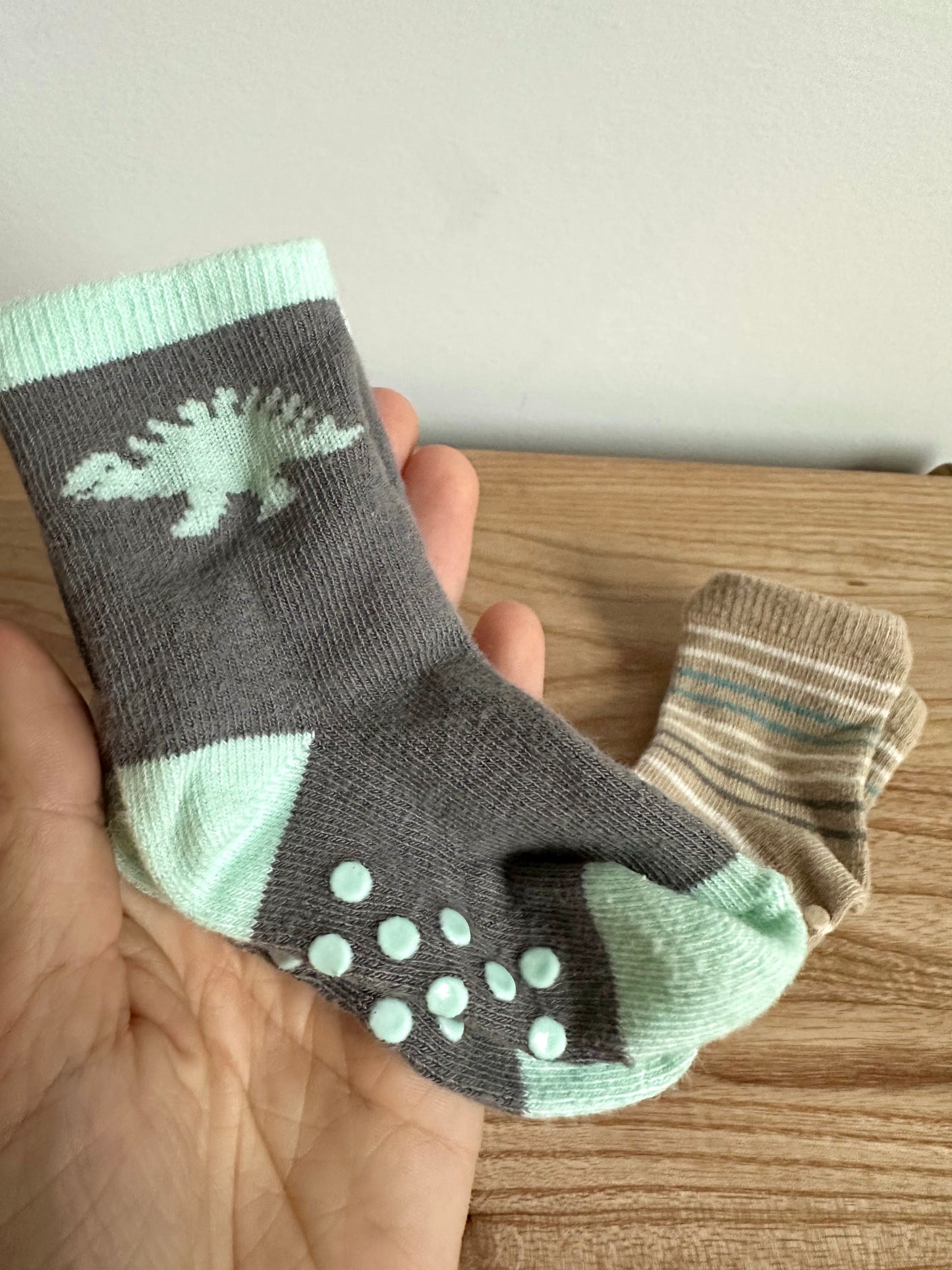 Grippy Dino + Stripe Socks (2) / 0-3m?