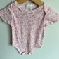 Pink Floral Bodysuit / 0-3m