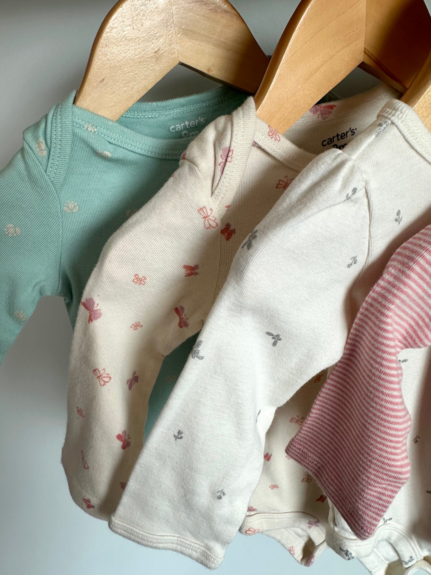 Set of 4 Long Sleeve Bodysuits / 9m