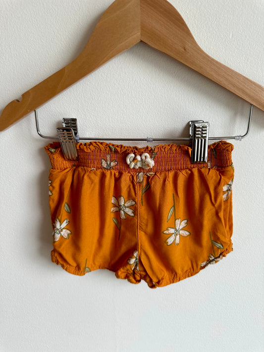 Orange Floral Shorts / 6-12m