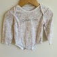 Calvin Klein Rose Bodysuit / 18m
