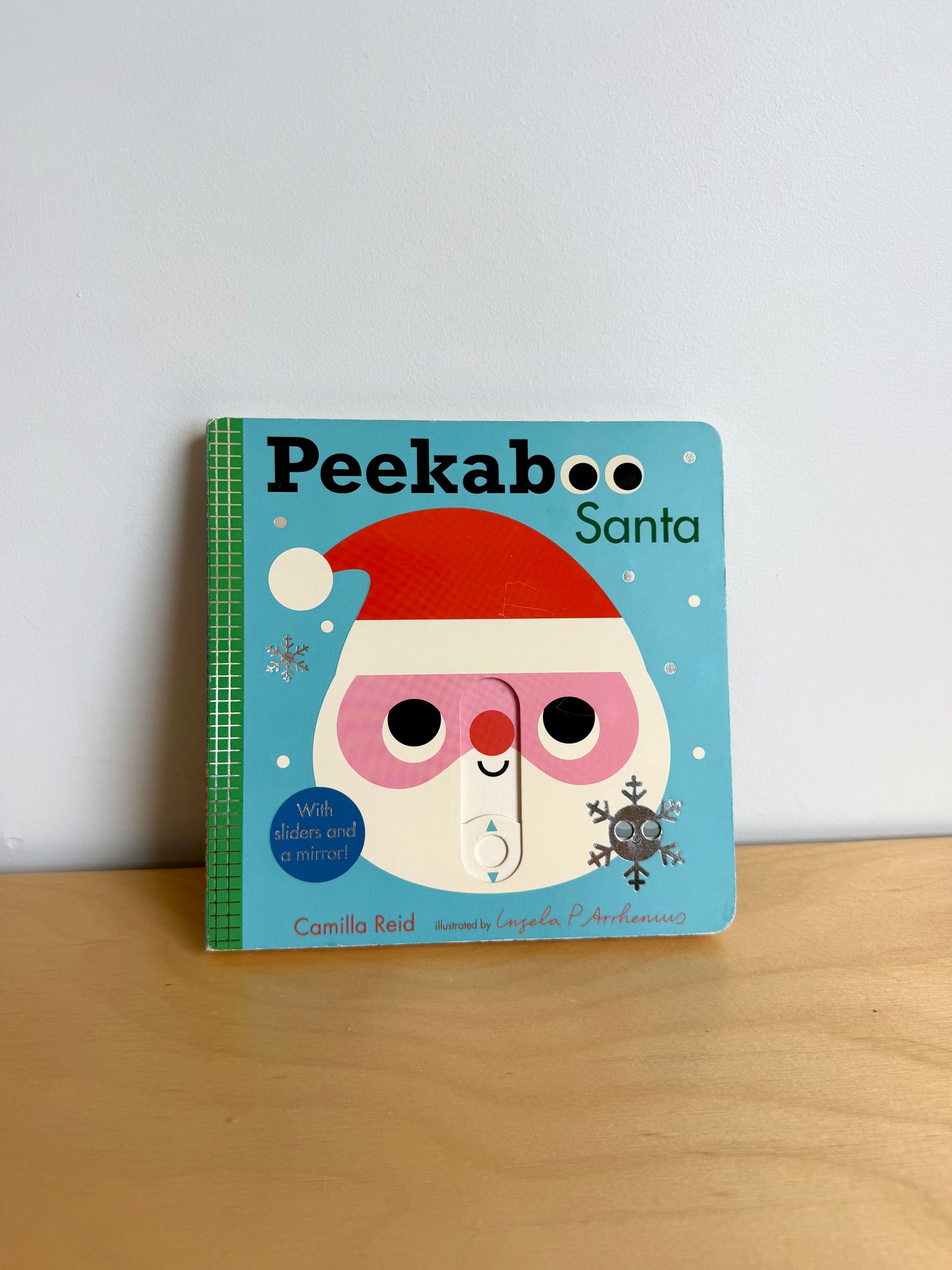 Peekaboo Santa: Sliders + Mirror Book / 0-2 years