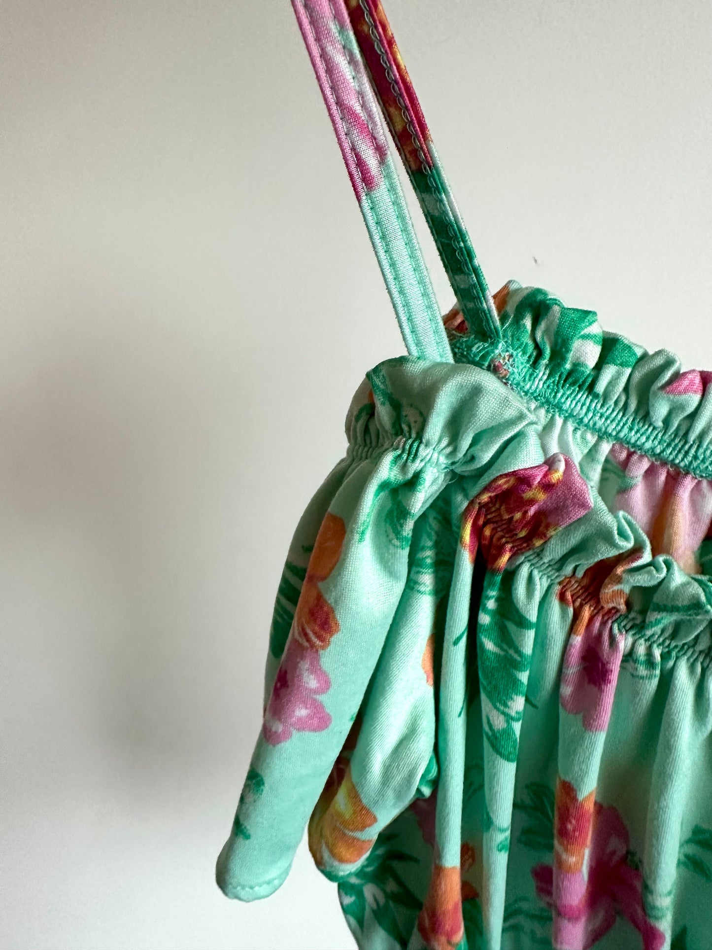 Turquoise Floral Romper / 10 years