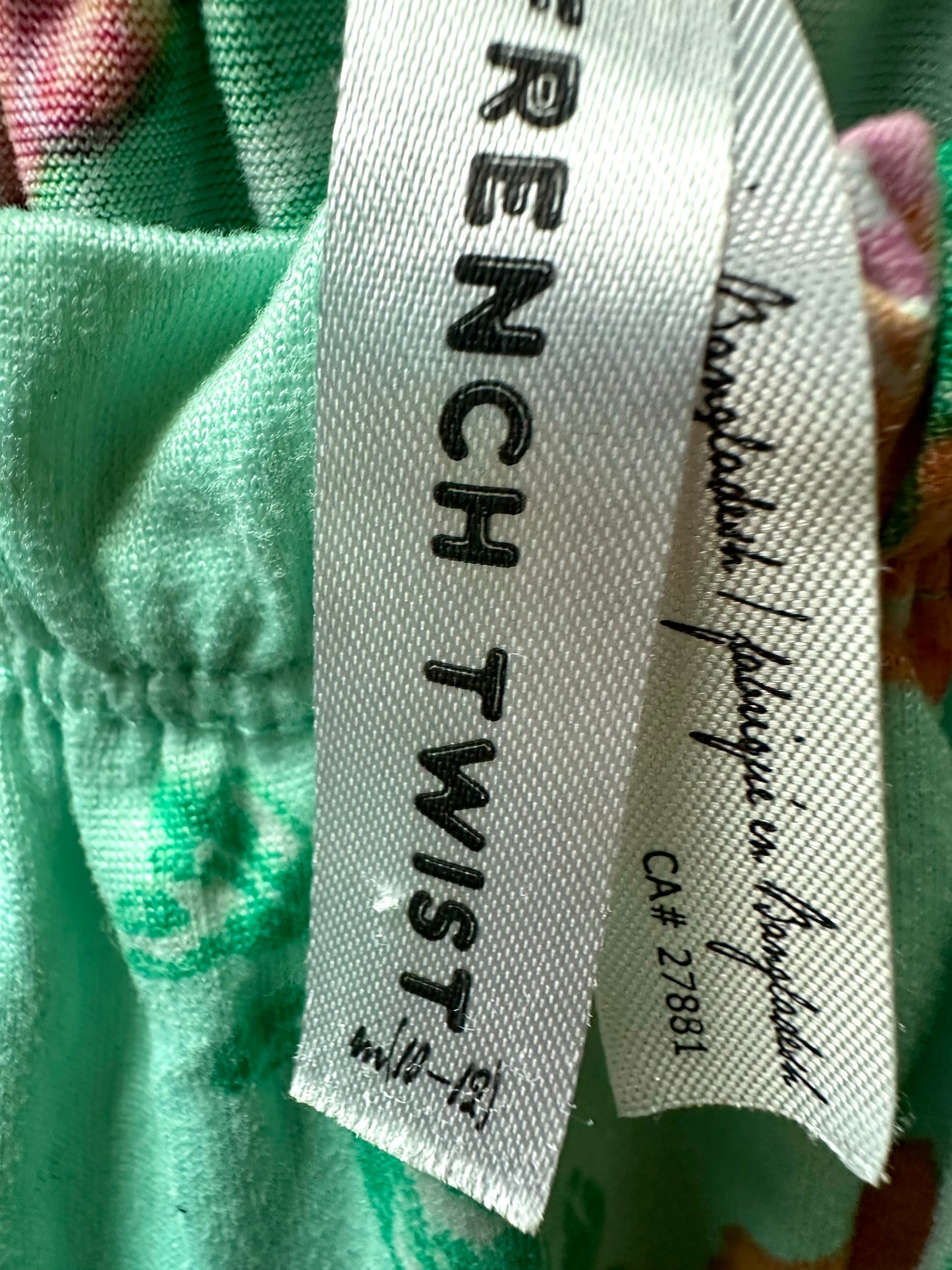 Turquoise Floral Romper / 10 years