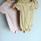 Set of Two Dotted Animal Pocket Bodysuits / 12m