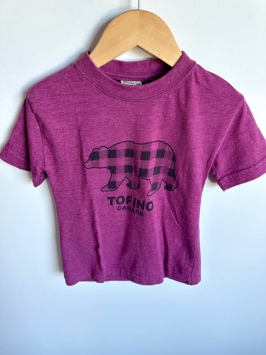 Purple t-shirt with a bear graphic and 'Tofino Canada' text 