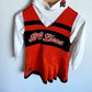 Orange and white sports uniform with 'BC Lions' text 