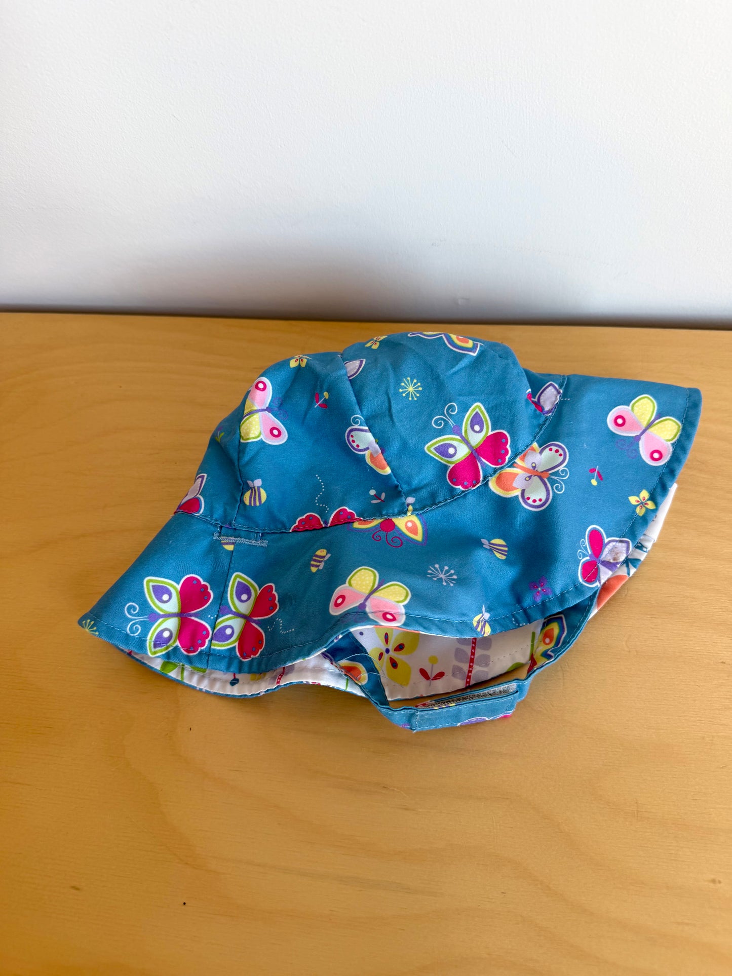 Reversible Floral + Butterfly Bucket Strap Hat / 0-6m