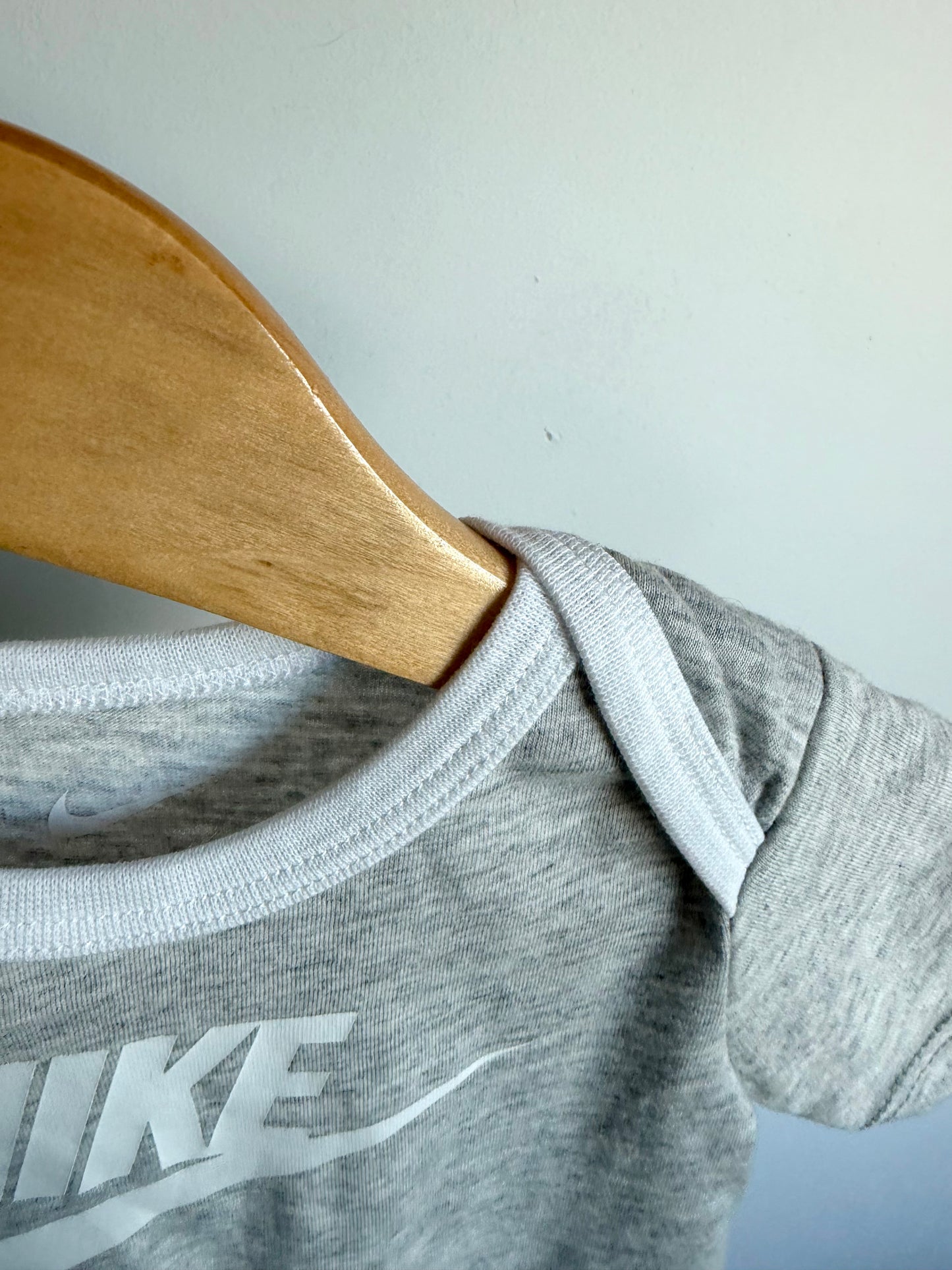 Nike Grey Bodysuit / 0-6m