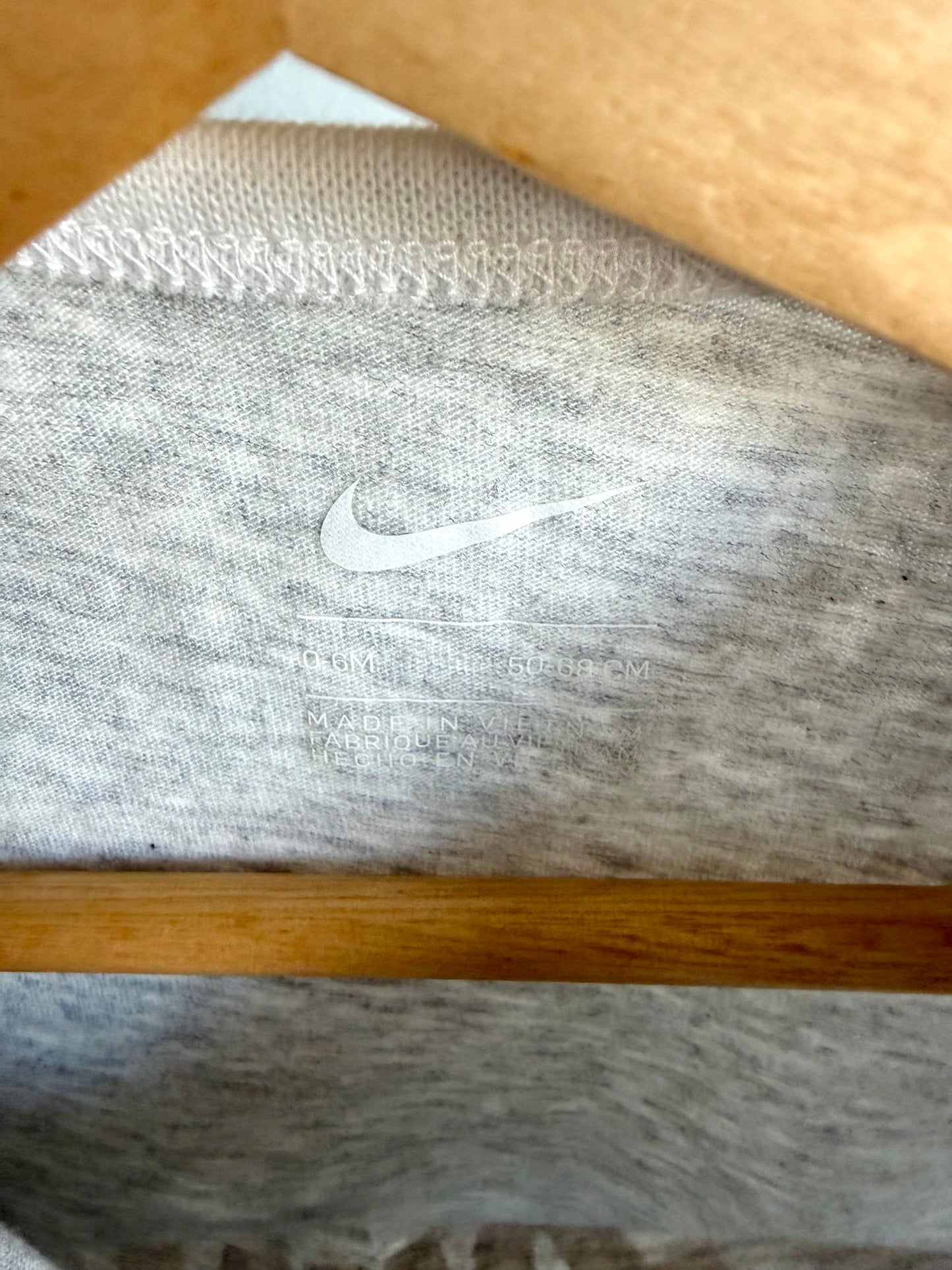 Nike Grey Bodysuit / 0-6m