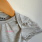 DKNY Grey Bodysuit / 3-6m